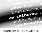 Small photo of ex cathedra word in a dictionary. ex cathedra concept