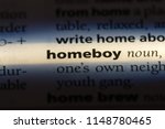 Small photo of homeboy word in a dictionary. homeboy concept.