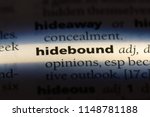 Small photo of hidebound word in a dictionary. hidebound concept.