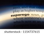 Small photo of superego word in a dictionary. superego concept.