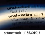Small photo of unchristian word in a dictionary. unchristian concept.