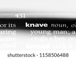 Small photo of knave word in a dictionary. knave concept.