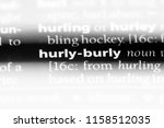 Small photo of hurly burly word in a dictionary. hurly burly concept.
