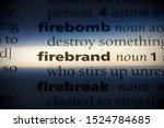 Small photo of firebrand word in a dictionary. firebrand concept, definition.