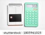 Small photo of calculater ,pen and blank notebook for office on white background isolated. credit card