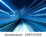 Train moving fast in tunnel 