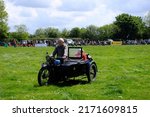 Small photo of 29th May 2022- A man riding his vintage Triumph NSD motorcycle and sidecar at a classic vehicle show near Newcastle Emlyn, Ceredigion, Wales, UK.