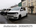 Small photo of 20th February 2024- A stylish Volkswagen Transporter T28 Startline Tdi, white panel van, parked in the town center at Carmarthen, Carmarthenshire, Wales, UK.