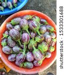 Small photo of Indian brinjal Baingan Aubergines closeup purple color fresh harvested farming market Maharashtra India