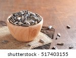 roasted sunflower seeds in wood ... | Shutterstock . vector #517403155