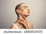 Small photo of Gay man with sensuous expression. man with too femme written on his face.