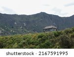 Small photo of Cotopaxi, Ecuador; 05-24-2022: Precarious wooden house on the hill of a dormant volcano