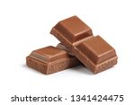 Cubes of milk chocolate bar isolated on white background