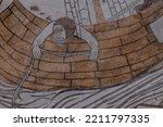 Small photo of seasick sailor haning out over the gunwale, an old fresco from the 1500s in Kirke Hyllinge church, Denmark, October 4, 2022
