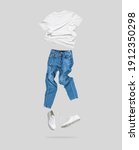 Small photo of White flying cotton T-shirt, blue jeans, white leather sneakers isolated on gray background. Clean white Unisex T-shirt. Branding clothes. Mock up for your design. Spring Summer Women's Clothing