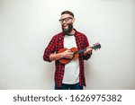 Handsome Hipster Guy Plays...