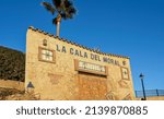 Small photo of La Cala del Moral, Malaga, Spain. Circa March 2022. Sign reading La Cala del Moral at the entrance of namesake Mediterranean town in the province of Malaga, Spain.