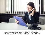 Small photo of Organized responsible office worker business woman giving instructions via phone call.Looking confused checking notes and paperwork.Manager solving mistake.Disputes,problems,Complaint,grievances