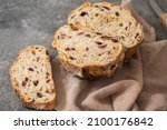 Halved sourdough fruit bread with dried apricots, cranberries and hazelnuts.