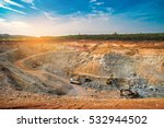 Aerial view of opencast mining quarry with lots of machinery at work - view from above.This area has been mined for copper, silver, gold, and other minerals,Thailand