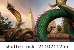 Small photo of King of Nagas and Pagonda at Wat Amphawan,Wat Phra That Nong Bua, Ubon Ratchathani province, Thailand