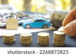 Small photo of Saving money for a car can be done by setting a budget, researching affordable options, negotiating with dealers. Planning ahead can also help accumulate funds for a car purchase.