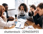 Small photo of Tired business team are having a briefing meeting, can't find ideas for project. Exhausted male and female employees fail a startup, upset about work troubles, unsuccess and overwork concept