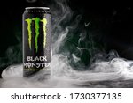 Black monster energy drink can. ...