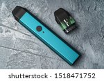 stock-photo-vape-pod-system-or-pod-mod-with-changeable-cartridges-close-up-newest-generation-of-vaping-1518471752.jpg