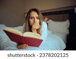 
Focused Woman Reading a Captivating Book in Bed
Millennial girl enjoying an interesting thriller novel with plot twists 
