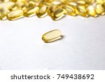 Small photo of omega 6: conjugated linoleic acid (CLA) in capsules on the white background