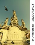 Small photo of Baroque rococo monument erected by the Catholic Society of St. John (Jan) Nepomuk in 1756. At the top of the monument is the statue of St. Mary.