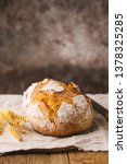 Small photo of Fresh homemade crisp bread on wooden background. French bread. Bread at leaven. Unleavened bread