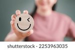 Small photo of wooden label with happy smile relax face , good feedback rating, think positive, customer review, assessment, satisfaction, world mental health day, Calm mood, good mental health, good mood.