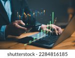 Small photo of Planning and strategy, Stock market, Business growth, progress or success concept. Businessman or trader is showing a growing virtual hologram stock, invest in trading. Return on stocks mutual funds