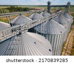 Granary elevator for export wheat, Silos agro plant for processing drying cleaning, storage of agricultural products grain. Large iron terminal of grain