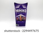Small photo of Norway 27 april 2023: Cadbury Heroes Dairy Milk Wispa Fudge Eclairs Crunchie bits Twirl and Dairy milk caramel Dinky Decker and Crene Egg Twisted chocolate collection container pack from England