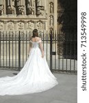 Small photo of Notre Dame cathedral, Paris , France, Europe , 7th Aug, 2017 : Earlene D'Sousa is giving pose in a beautiful long off shoulder long white dress for her much awaited pre wedding photo shoot in paris.