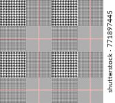 Prince of Wales / glen plaid patten in classic black and white with red overcheck. Seamless fabric texture.