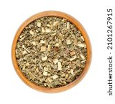 mugwort herb in a wooden bowl.... | Shutterstock . vector #2101267915