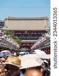 Small photo of Tokyo, Japan - July 30, 2023:Lively shopping promenade preceding Asakusa Temple Bursting with traditional stalls, souvenirs, and delectable street food, immersing visitors in vibrant cultural commerce