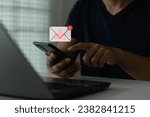 Small photo of Cyber security threat and online fraud concept. Fraud email spam icon, phishing scam alert on smartphone. danger website address, fake SMS messages warning on mobile phone. Bank account attack hacker.