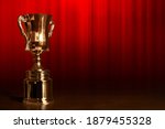 champion golden trophy cup... | Shutterstock . vector #1879455328