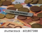 Small photo of lump sum payment - the word was printed on a metal bar. the metal bar was placed on several banknotes