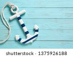 Anchor On A Blue Vintage Wooden ...