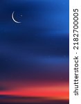 Islamic card with Crescent moon on Blue,Orange sky background,Vertical banner Ramadan Night with Dramtic Suset,twilight dusk sky for Islamic religion,Eid al-Adha,Eid Mubarak,Eid al fitr,Ramadan Kareem