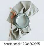 Small photo of Plate mockup,linen napkin, dry grass top view empty modern minimal table place setting neutral green colors . Space for text or menu .Business food brand template. Scandinavian style tableware.