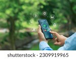 Small photo of carbon credit concept. Trader using a smartphone to trade carbon credit on application. carbon etf to invest in sustainable business. green climate funds investment. Net zero emission.Clean technology
