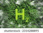 Small photo of H2 eco technology Renewable Clean energy. H2 symbol on green grass in the forest. Green Energy Hydrogen. Hydrogen's environmental friendliness and Potential as a future fuel.H2 hydrogen innovation.