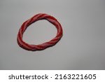 isolated white red hair tie